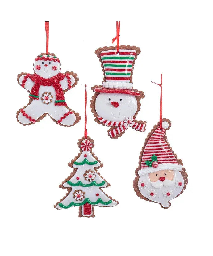 Claydough gingerbread ornament with white frosting decoration hanging from a red string.