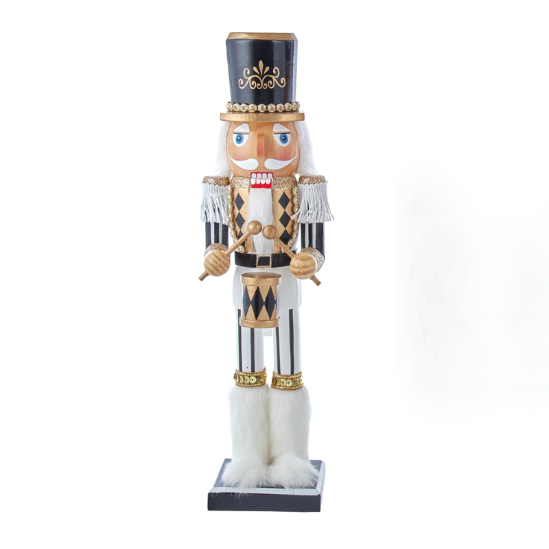 15-inch wooden nutcracker drummer in a black, white, and gold uniform with white faux fur boots.