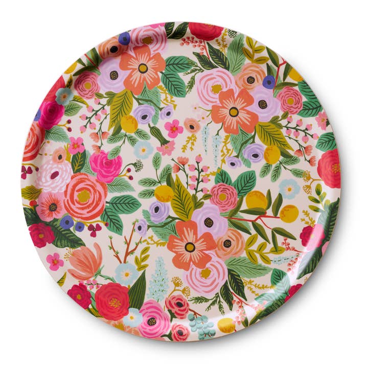 Round serving tray with a vibrant, full-color floral pattern on a light background.