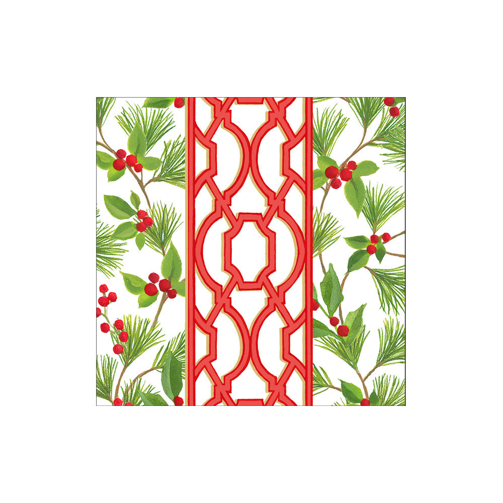White cocktail napkin with red lattice pattern and pine branches with red berries.