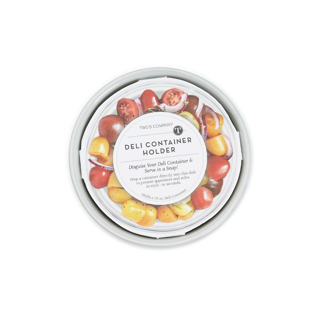 Top view of a white porcelain deli container holder with a label showing a tomato salad.