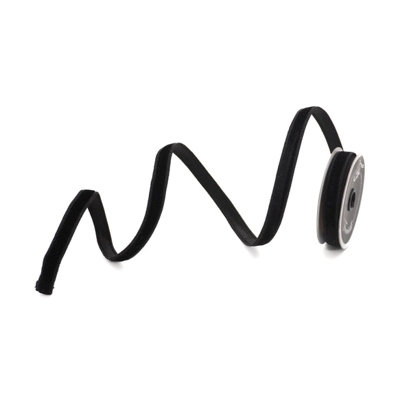 .75-inch wired velvet ribbon with a luster finish in neutral tone.