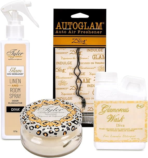 Glam Gift Suite VI gift set featuring a linen spray bottle, jar candle, wash container, and car freshener.