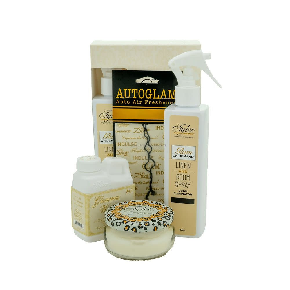 Glam Gift Suite VI gift set featuring a linen spray bottle, jar candle, wash container, and car freshener.