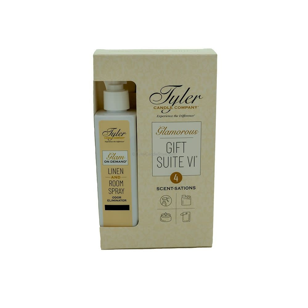 Glam Gift Suite VI gift set featuring a linen spray bottle, jar candle, wash container, and car freshener.
