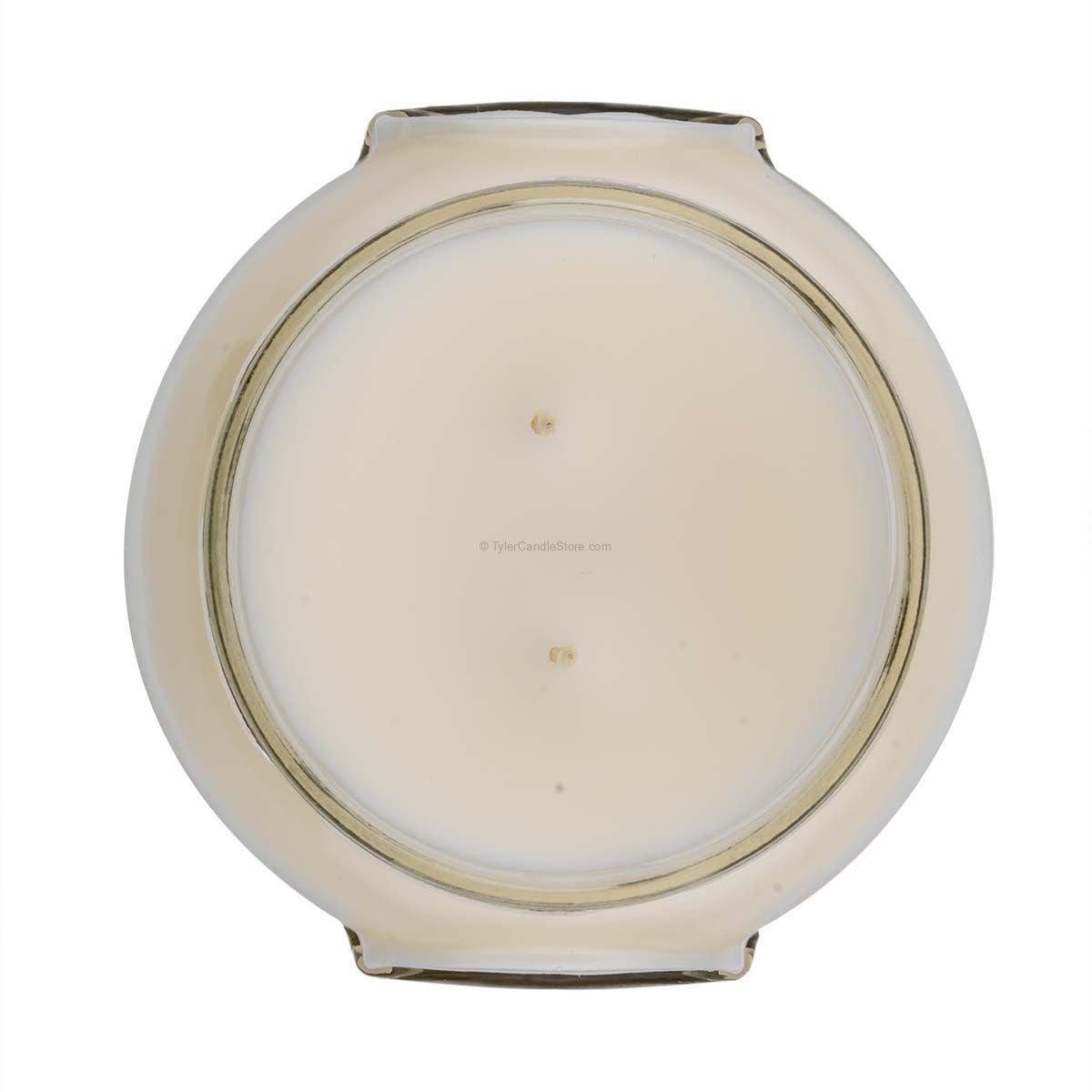 Glamfam candle in a clear glass jar with soy-paraffin wax blend and citrus-rosewood fragrance.