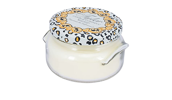 Glamfam candle in a clear glass jar with soy-paraffin wax blend and citrus-rosewood fragrance.