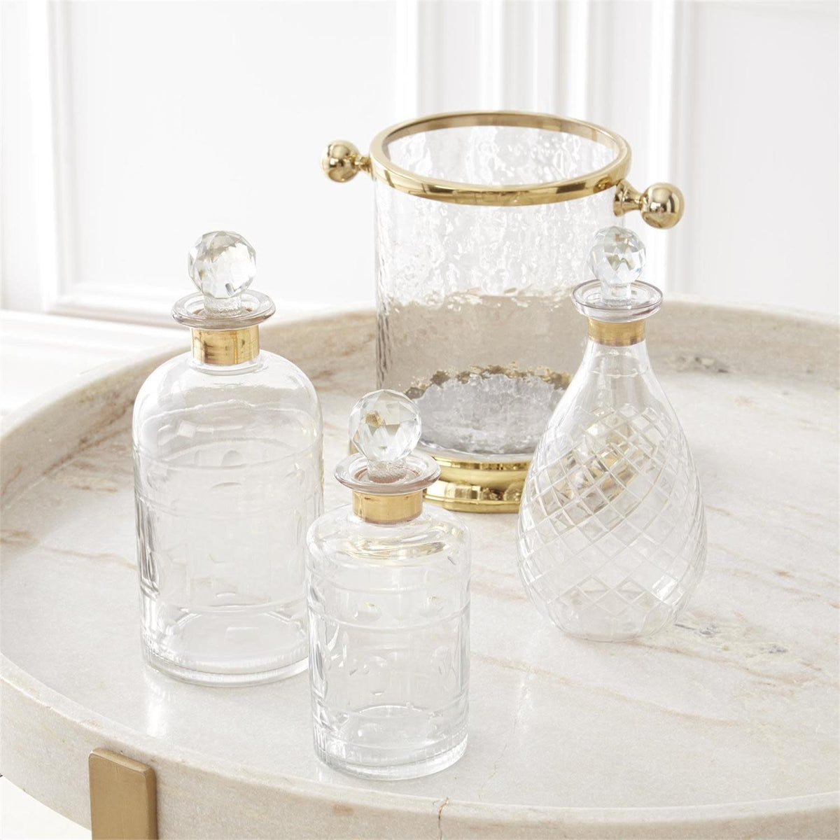 Glass decanter with gold rim trim