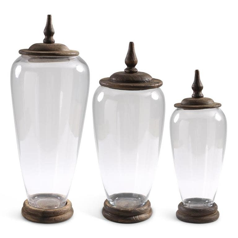 Tall glass jar with wood base and lid in natural finish