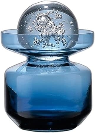 Clear glass vase with a sleek cylindrical shape and smooth finish.
