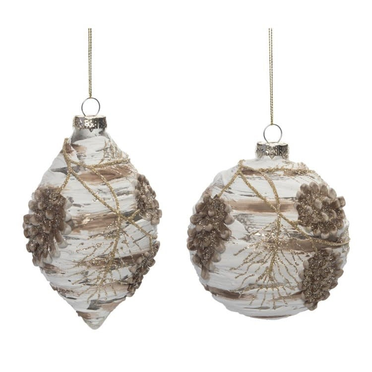 Glass woodland ornament with a forest scene featuring trees and sparkles.