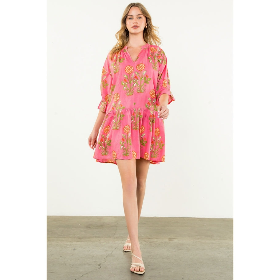 Hazel woven cotton short sleeve dress with floral print in a relaxed A-line silhouette.