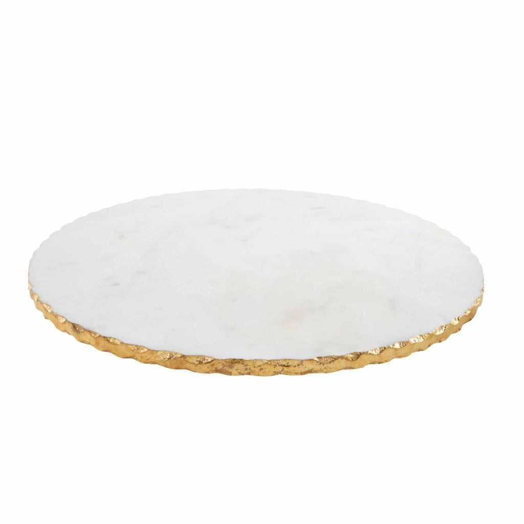 Round white marble lazy susan with a smooth circular top.