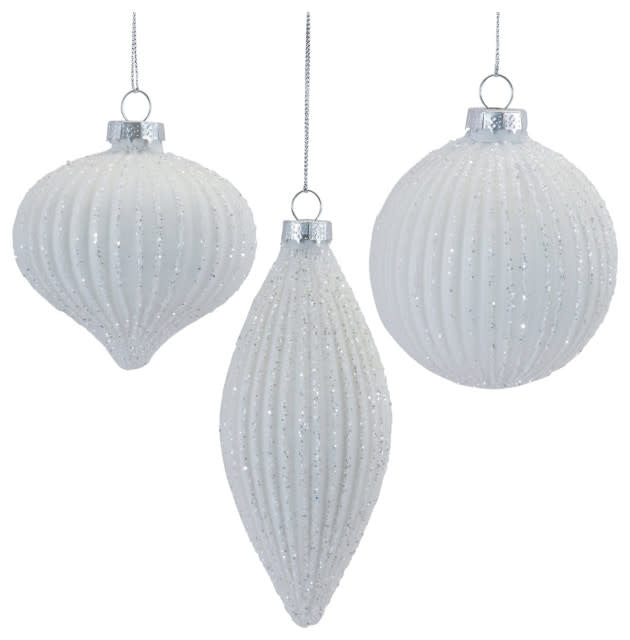 White glass Christmas ornament with silver ribbed texture and glitter accents.