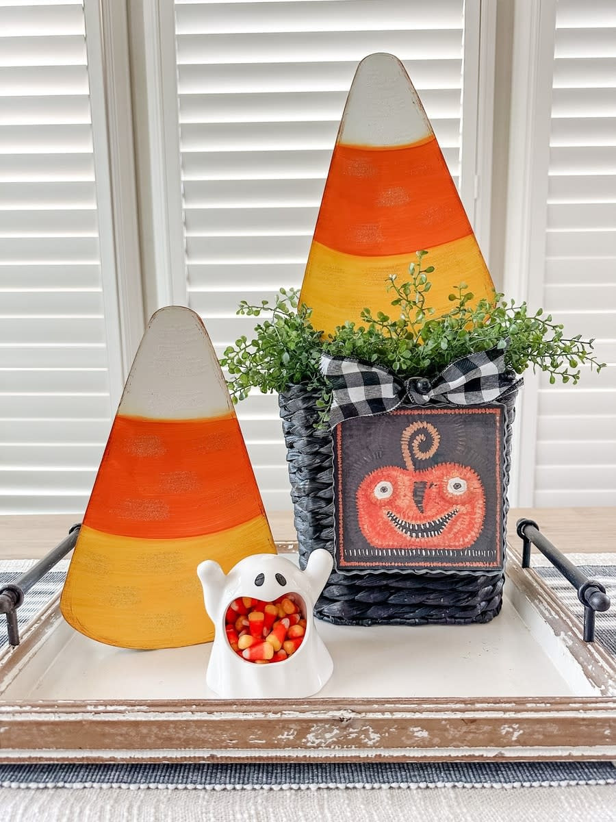 Glittered candy corn stake decoration in orange, yellow, and white with a sparkling finish.