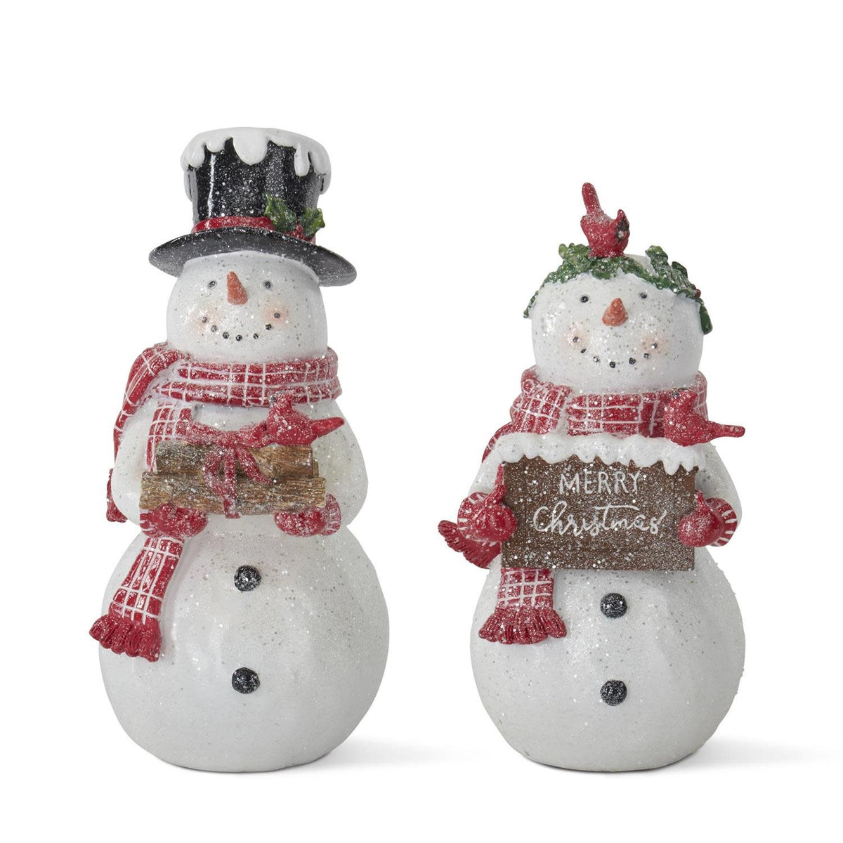 White polyresin snowman figurine with glitter accents on a tabletop.
