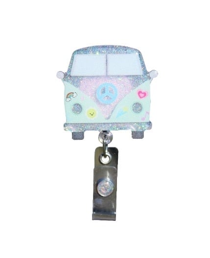 Glitterific badge reel featuring a hippie van glitter resin pin on a spinning alligator clip.