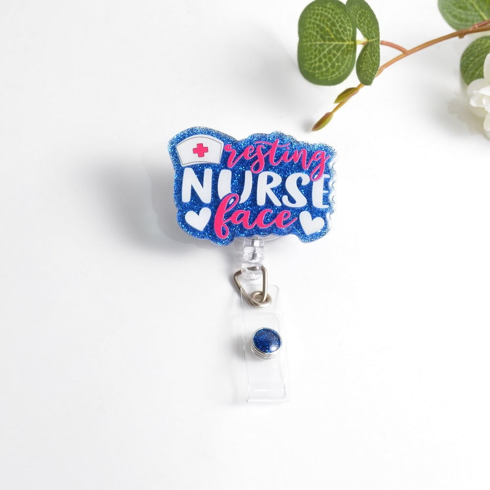 Glitterific badge reel featuring a nurse face silhouette with sparkly glitter resin material and an alligator clip.