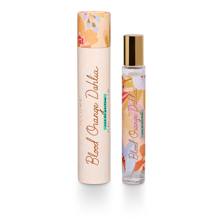 Illume Blood Orange Dahlia rollerball perfume with its floral-patterned cylindrical packaging.