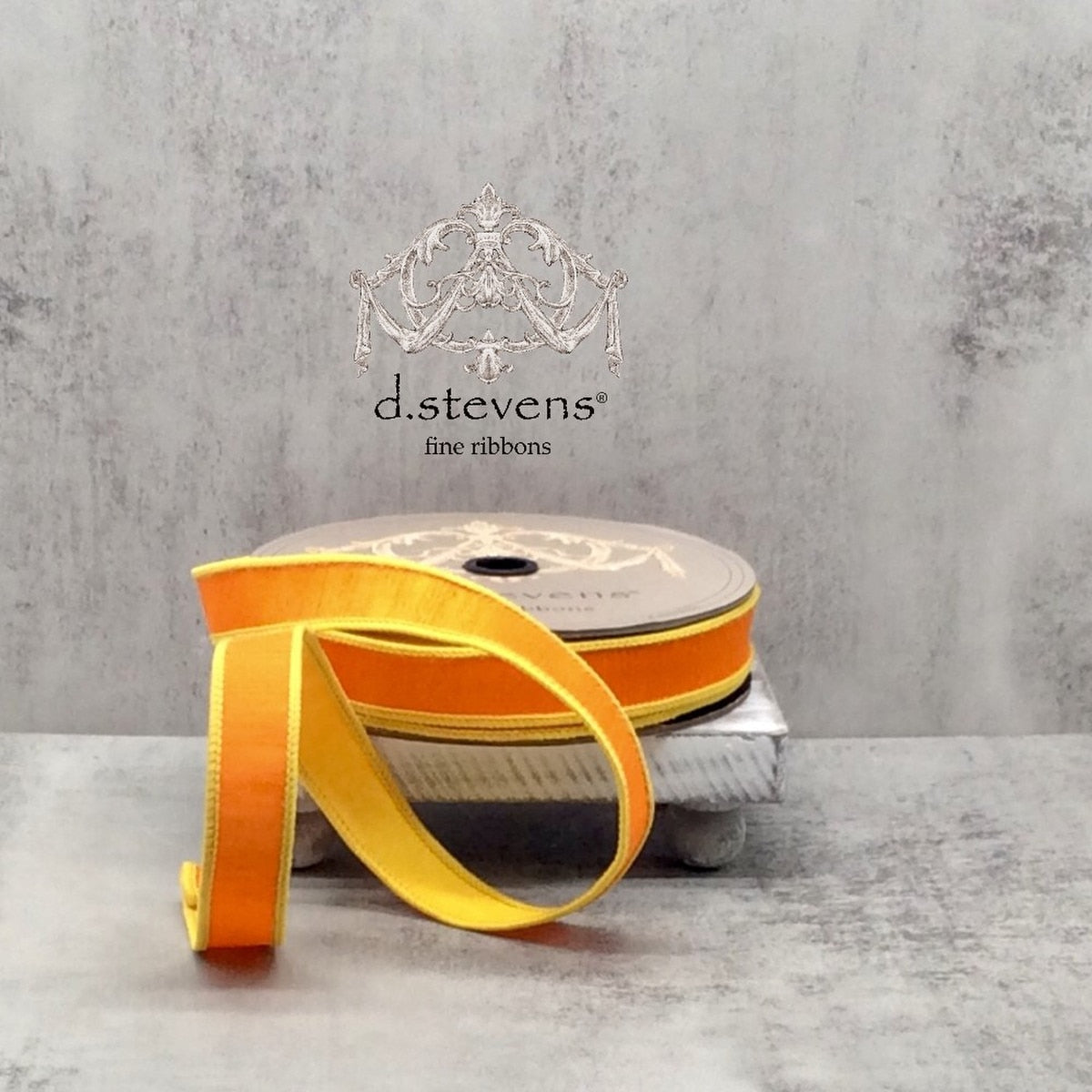 Double-sided dupion ribbon roll in natural cream color with a subtle sheen.