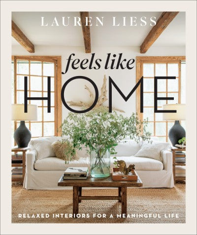 Hardcover book titled Feels Like Home featuring relaxed interior home designs with color illustrations.