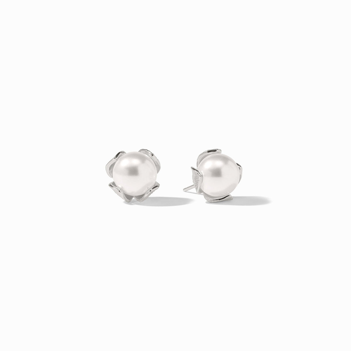 Penelope Stud Silver earrings featuring round white glass pearls in polished silver-plated settings.