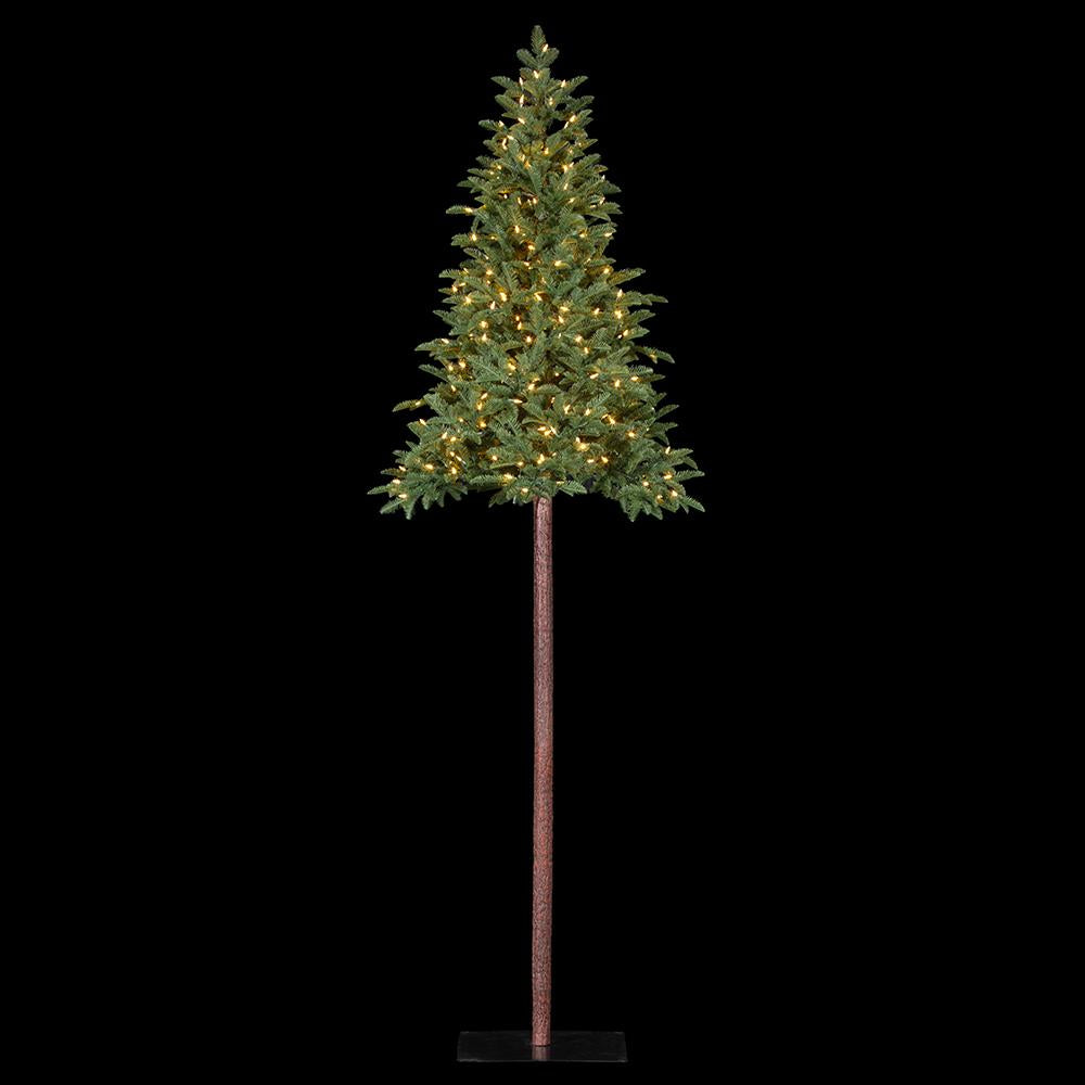 9' Pencil Pine Tree with 300 warm white LED lights on a long trunk and metal square stand.
