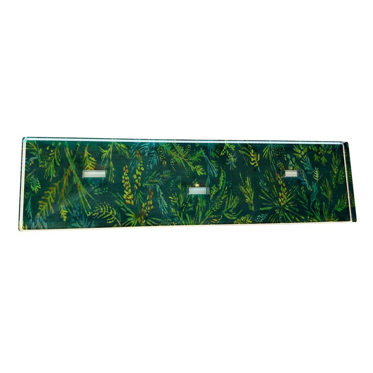 Acrylic extra long base with a pine needle-inspired natural wood grain pattern.