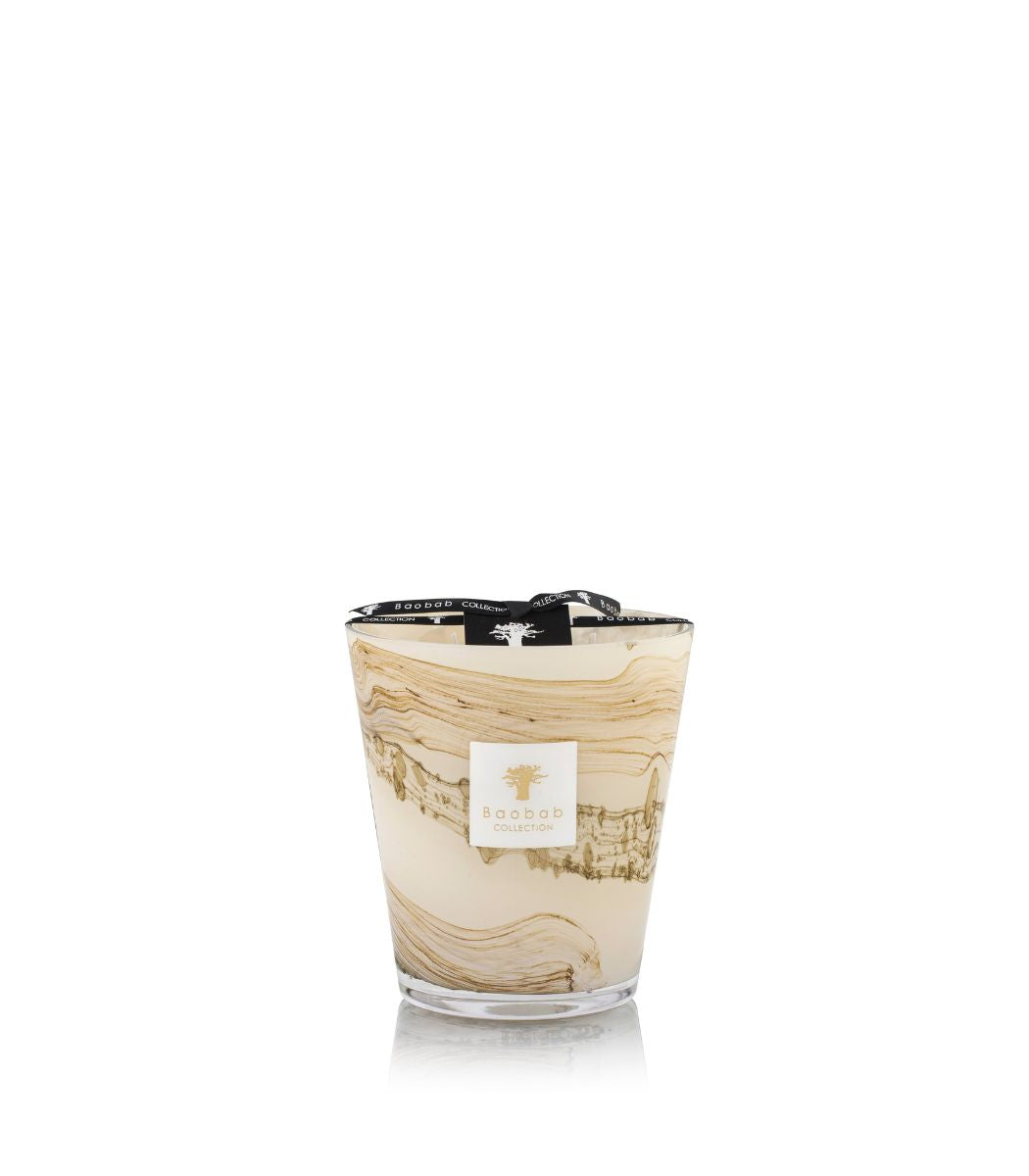 Baobab Collection Sand Siloli candle in a marbled beige and brown glass vessel.