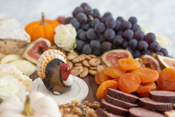 Mini Gobble Gobble plush turkey toy in brown fabric with orange beak.