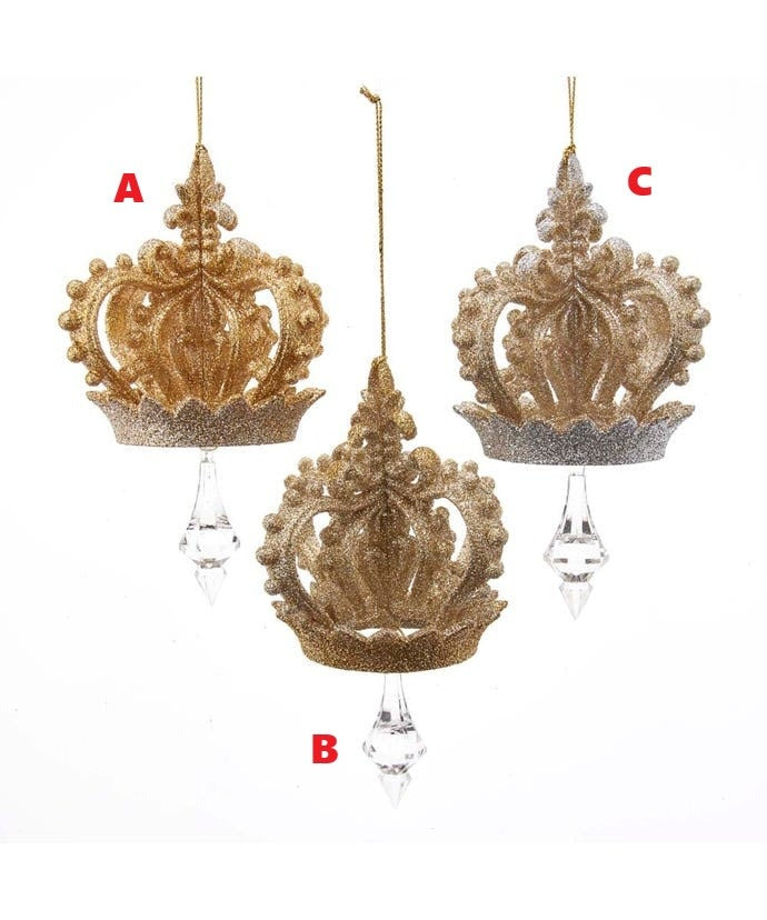 Plastic crown ornament with gold string featuring silver glitter accents on a clear chandelier drop.