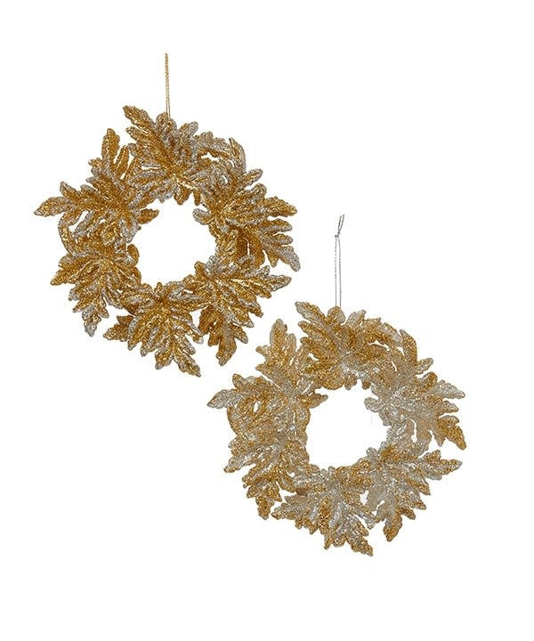 Acrylic Christmas ornament shaped like a gold glitter wreath hanging from a string.