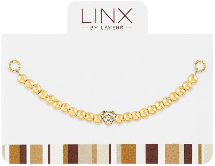 Gold LINX bracelet add-on featuring a gold bead and decorative cubic zirconia heart charm