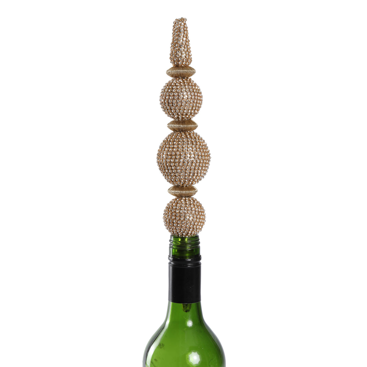 Gold bling bottle stopper with sparkling jewel-like finish sealing a wine bottle