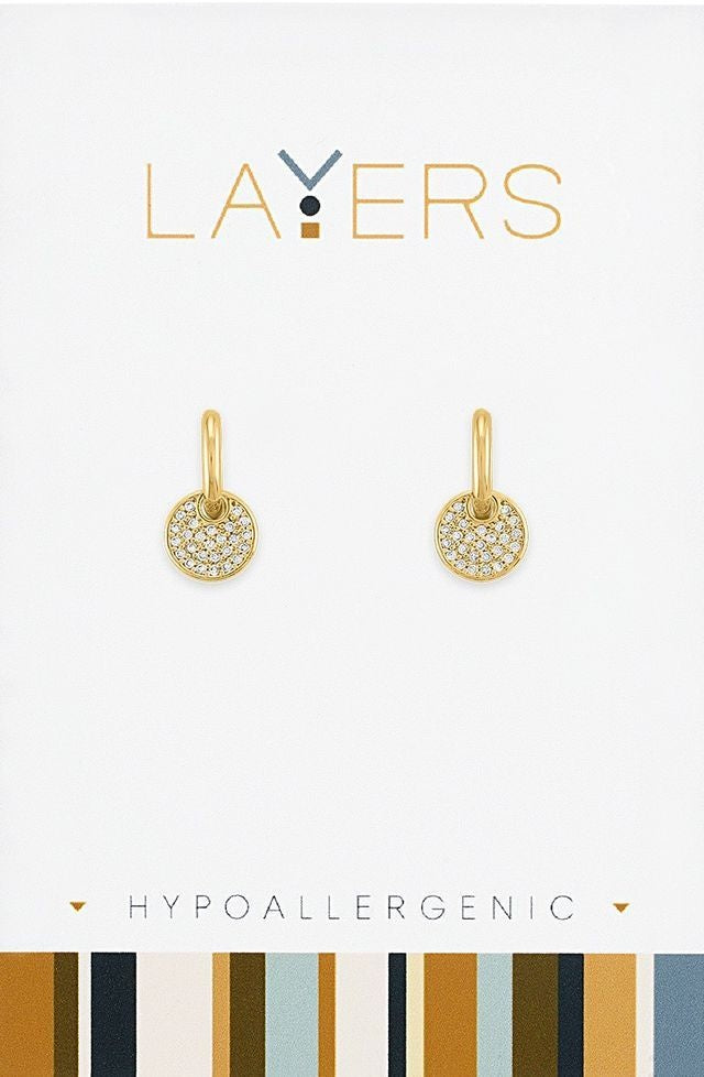 Gold huggie earrings with layered coin shapes featuring sparkling cubic zirconia stones.