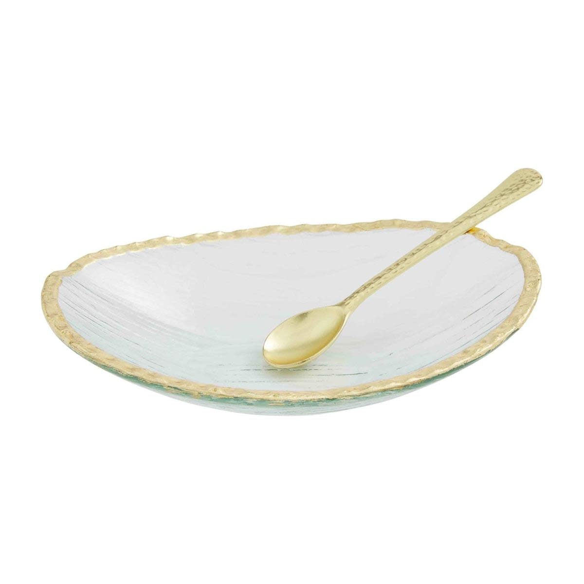 Glass dip bowl with gold raw edge rim paired with a brass plate spoon.