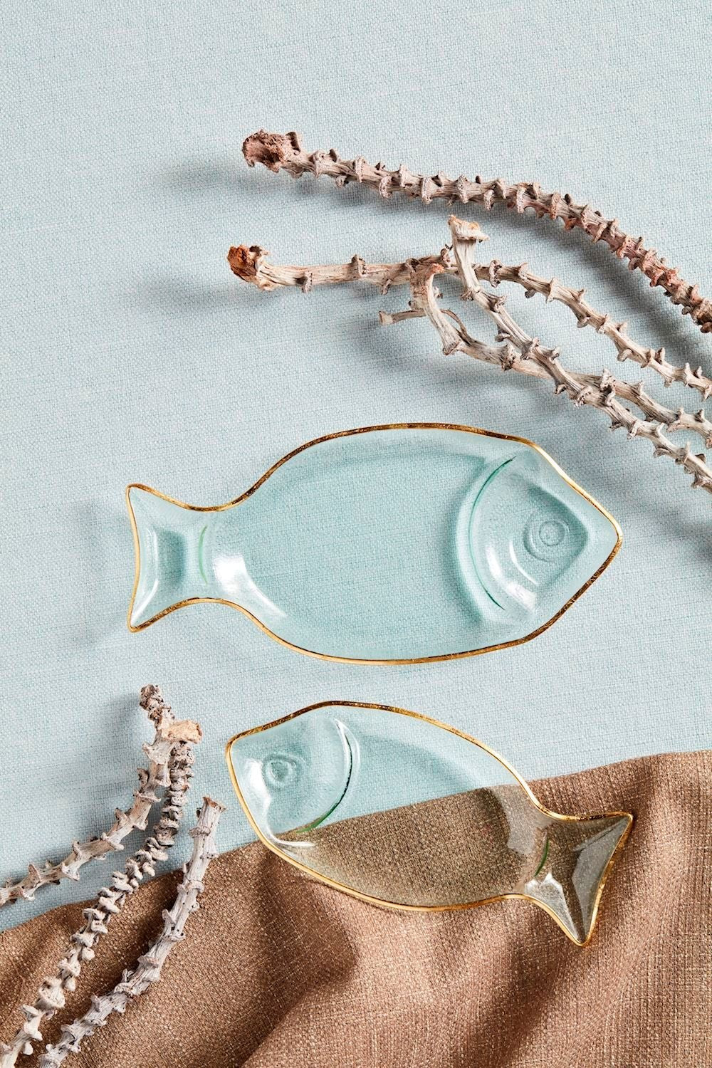 Nested textured glass fish trays with hand-painted gold rims