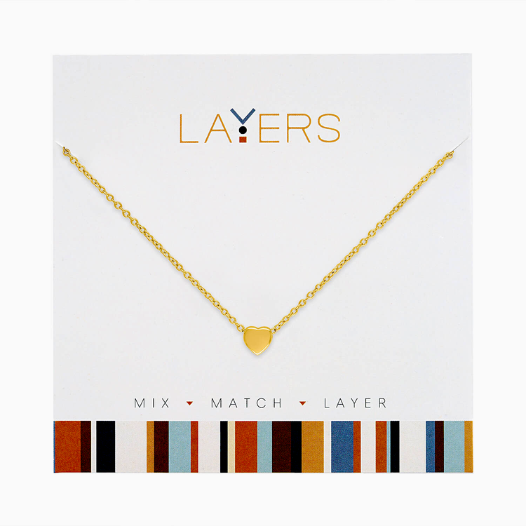 Gold layered necklace featuring heart-shaped pendants on delicate chains.