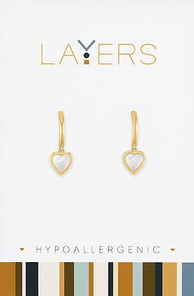 Gold layered huggie earrings with a small heart charm