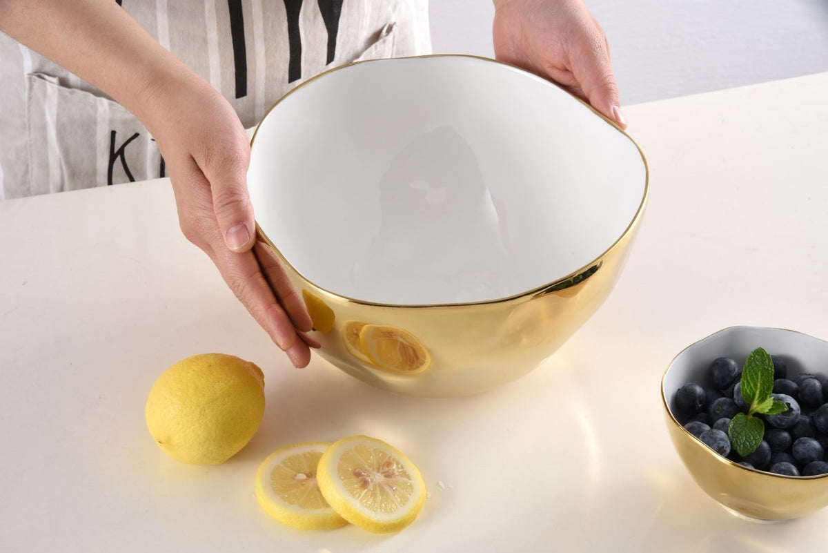Large white high-fired porcelain bowl with gold titanium accents from the Moonlight Collection.