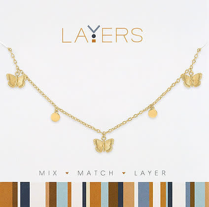 Gold multi-petite butterfly layered necklace with delicate chains.