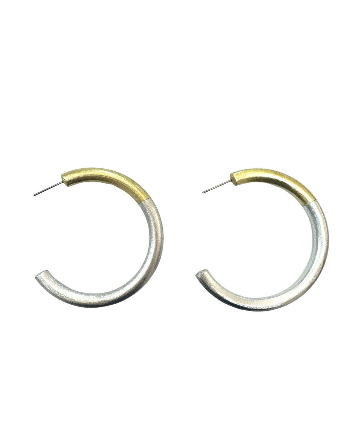 Gold hoop earring with a silver accent detail
