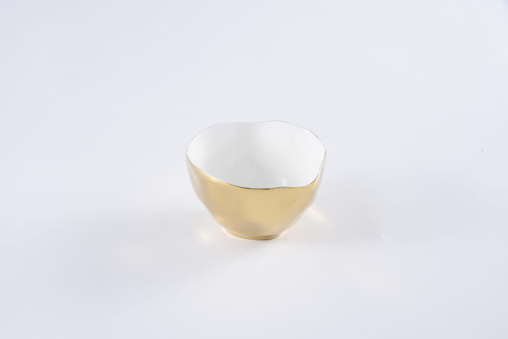 Small white high-fired porcelain bowl with gold titanium accents
