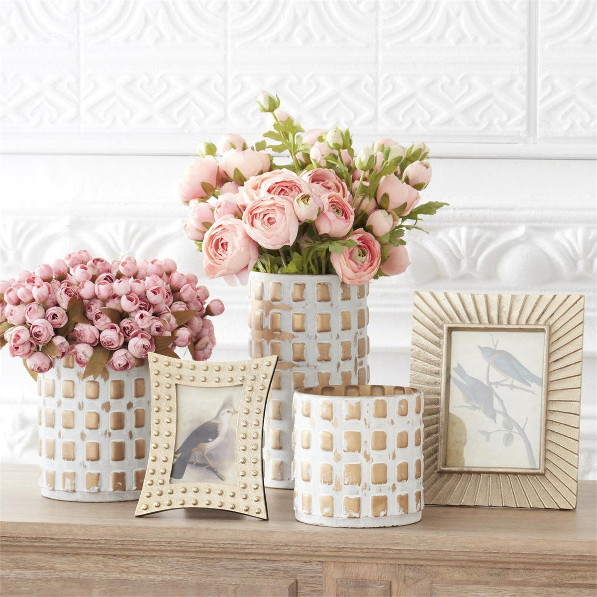 Glass cube container with gold and whitewashed finish featuring embossed detailing