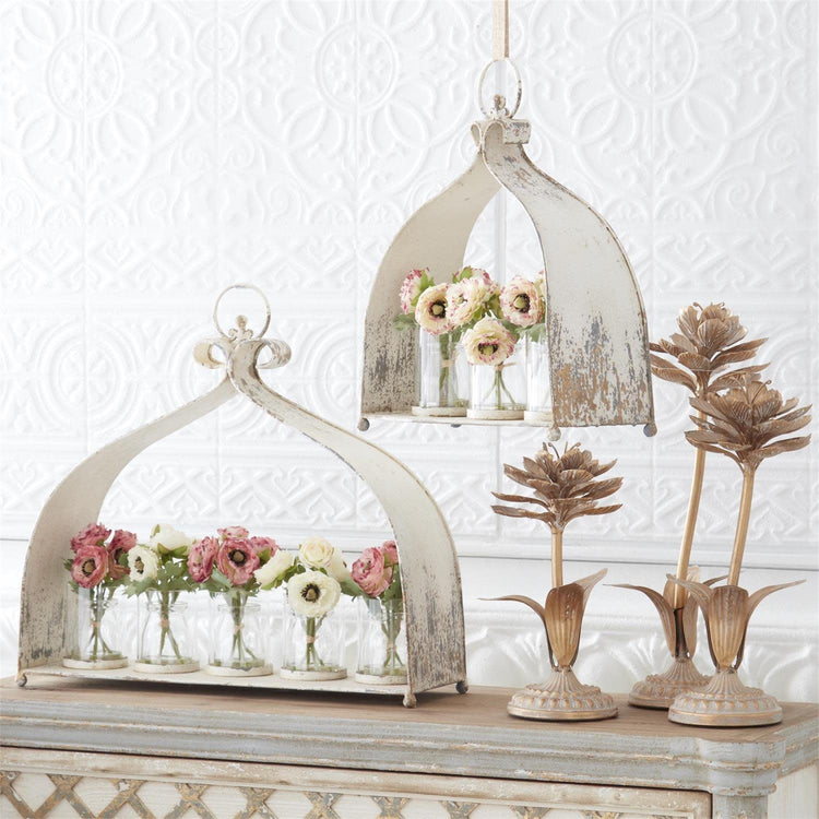 Gold whitewashed metal flower decor with cement finish