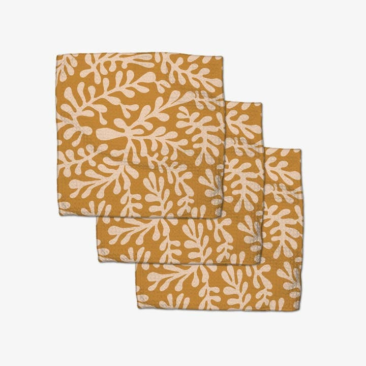 Set of three golden fall waffle weave dishcloths with single-sided print.