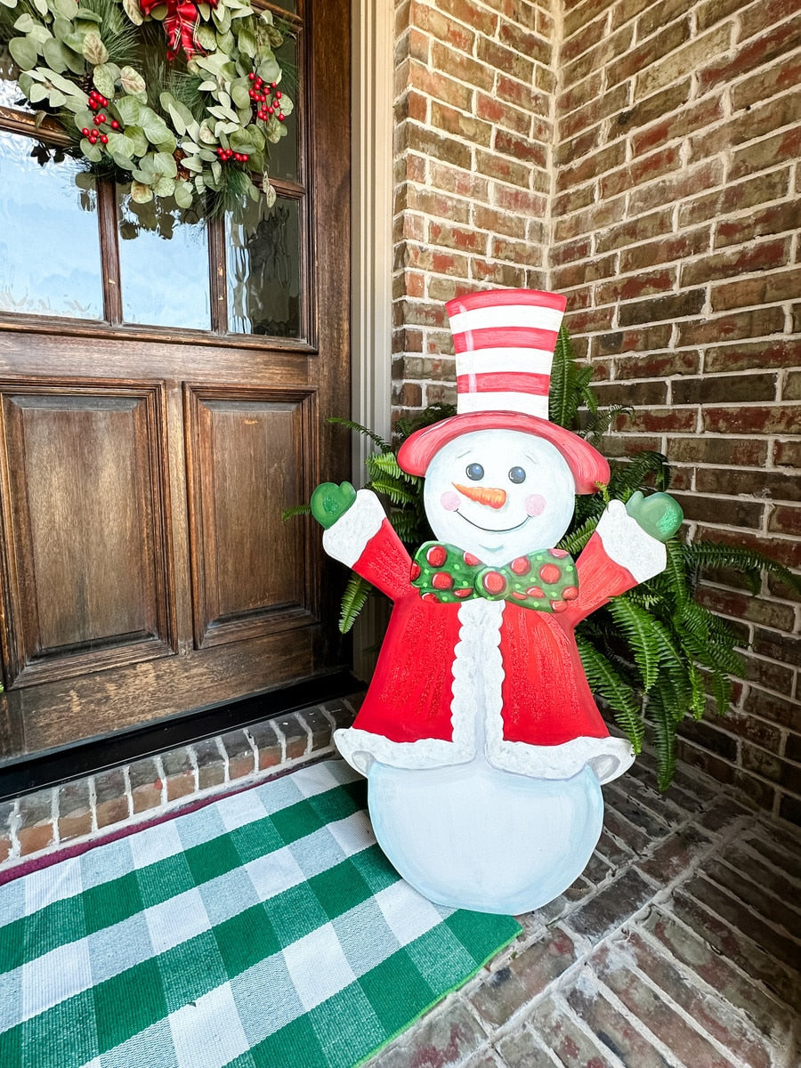 Joyful Snowman Yard stake featuring a white snowman silhouette with red scarf against a snowy background.