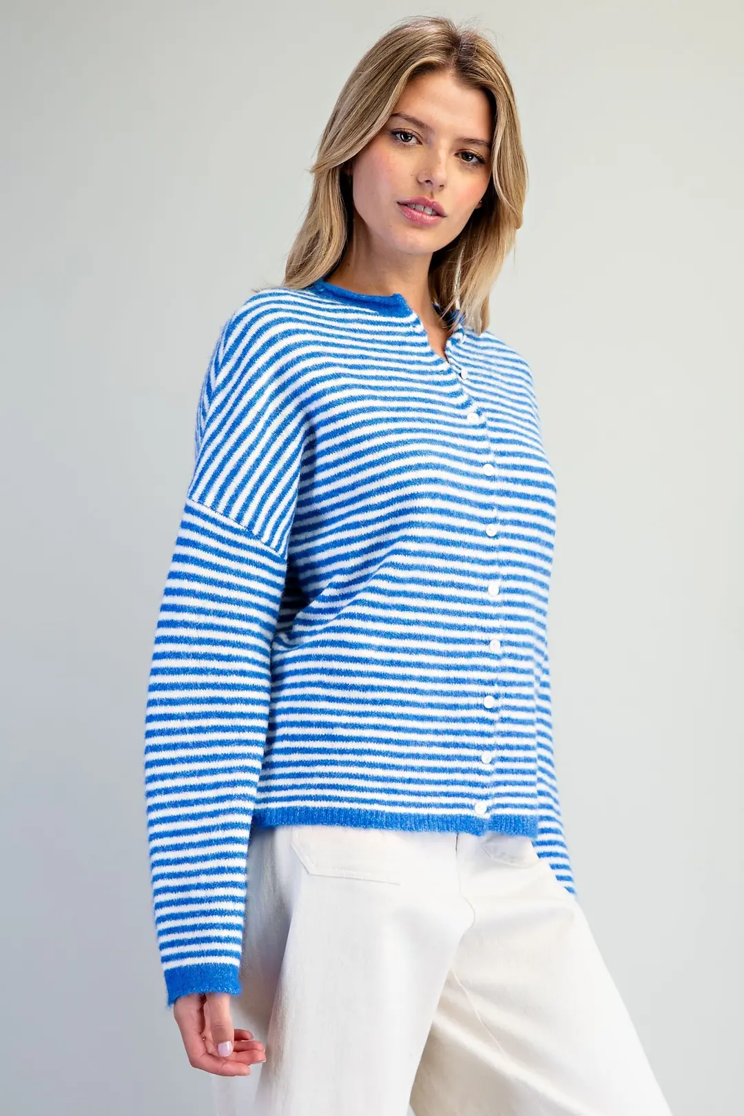Nevin Striped Knit Collard Cardigan Sweater in blue and white with a button front and crew neck.