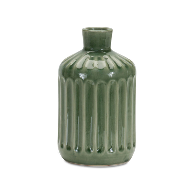 Terra cotta vase with a classic cylindrical silhouette in an earthy brown color.