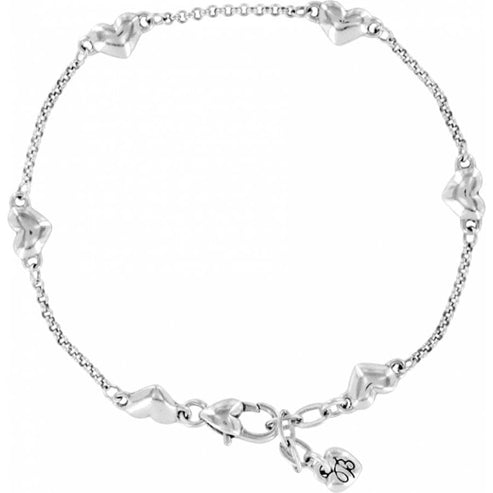 Silver plated Kiss & Tell Anklet featuring a chain with multiple heart-shaped charms.